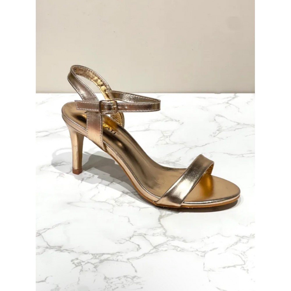 Dress sandal in champagne with stiletto heel