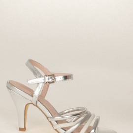 Dressy silver high heel sandal.